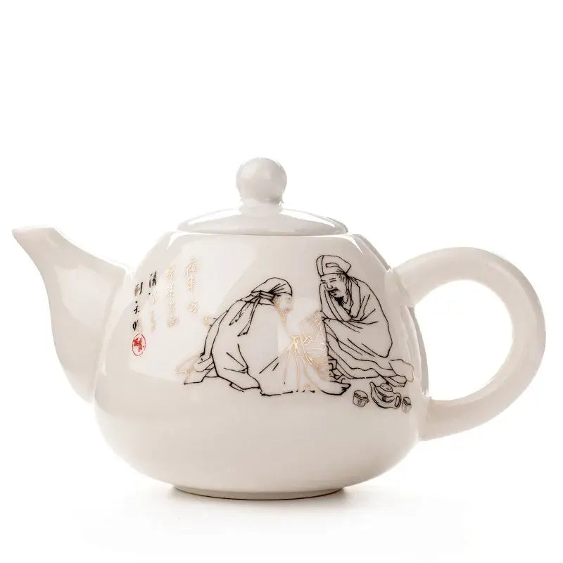 White ceramic dehua clay teapot with black ink illustrations gold detailing and red seal from decorbites tea set