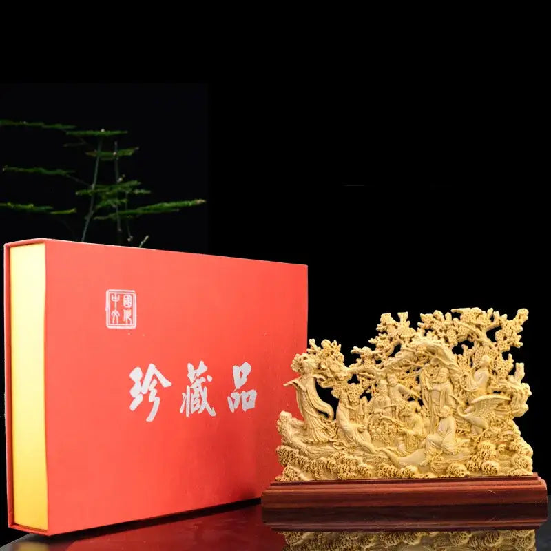 Elaborate golden-carved eight immortals sculpture on polished wooden base traditional ivory living room decor