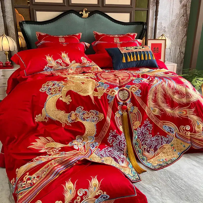 Traditional red satin bedding set with intricate gold and blue embroidery of dragons phoenixes and luxury gold loong decorbites luxury gold