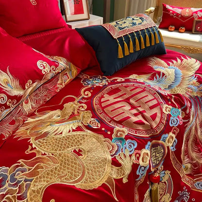 Traditional red satin bedding set with luxury gold loong embroidery featuring dragons phoenixes and double happiness symbol