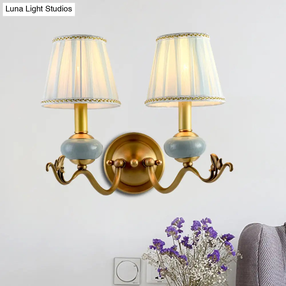 Traditional Style Brass Wall Sconce with Curved Arm, Fabric Shade