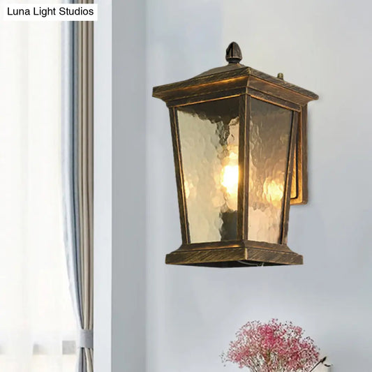Traditional Wall Sconce with Pavilion Glass Shade in Black/Brass