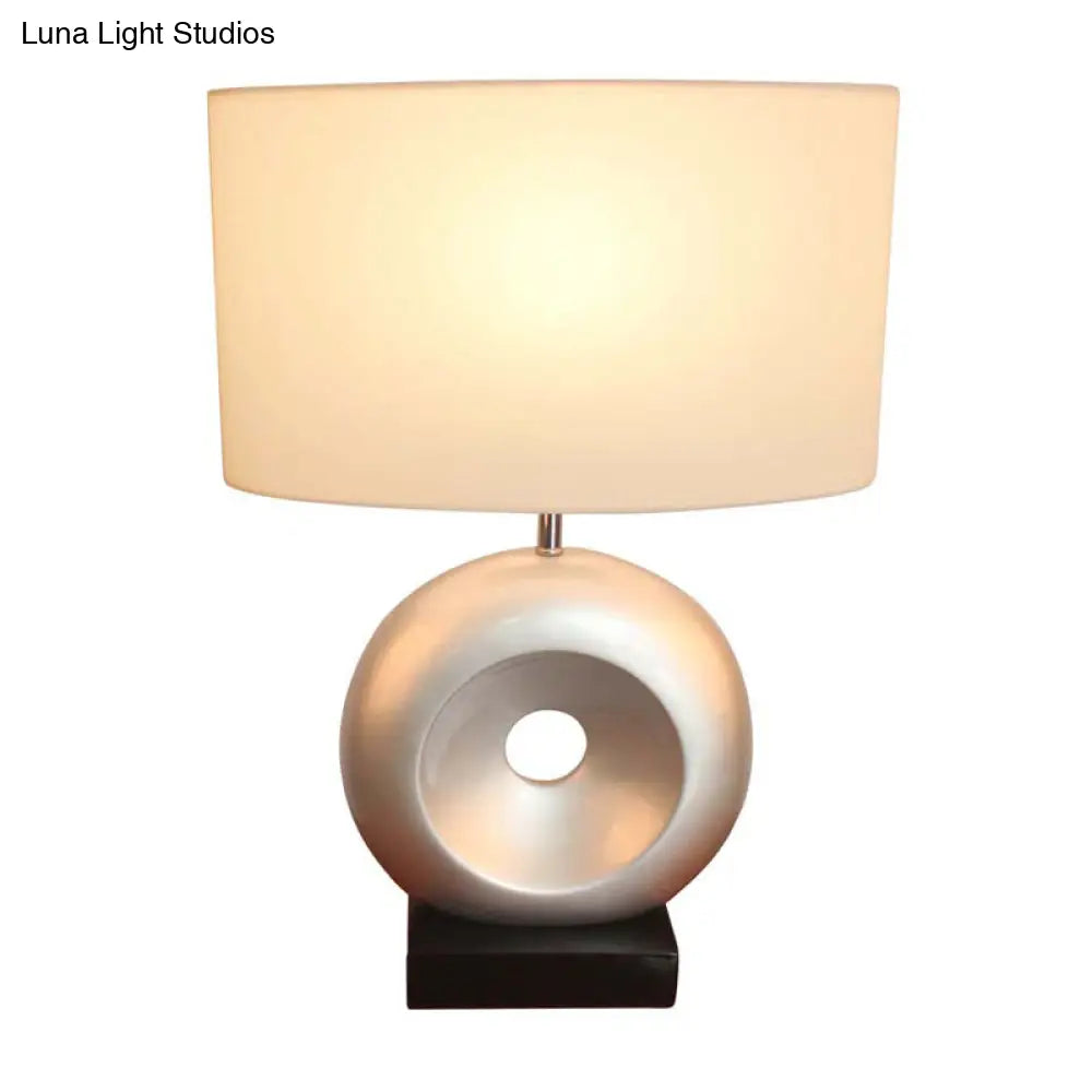 Transitional Resin Table Light with Silver/Black Finish, Rectangle/Drum Fabric Shade, and 1 Bulb