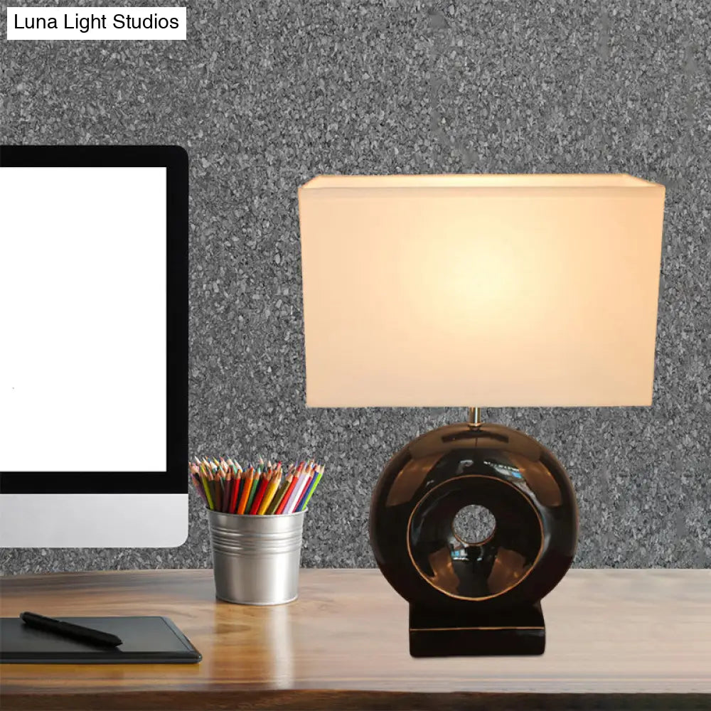 Transitional Resin Table Light with Silver/Black Finish, Rectangle/Drum Fabric Shade, and 1 Bulb