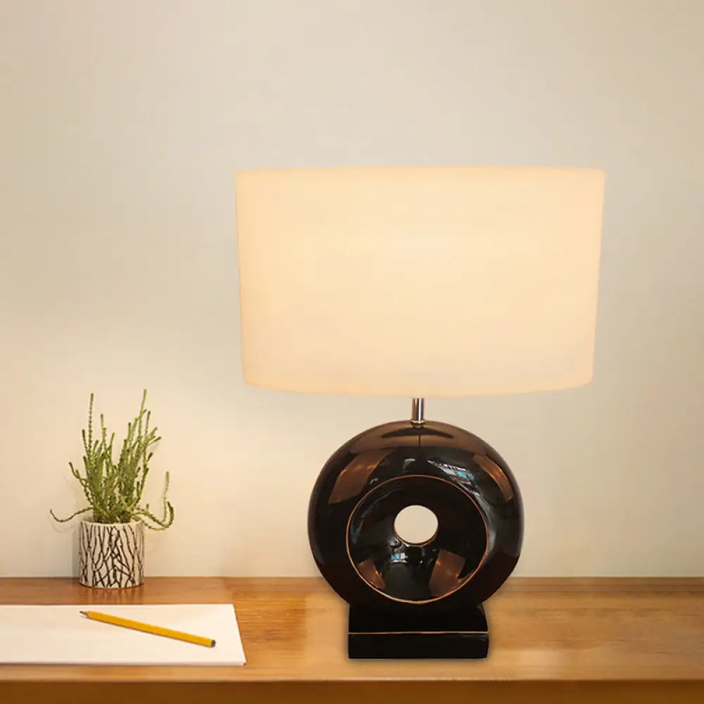 Transitional Resin Table Light with Silver/Black Finish, Rectangle/Drum Fabric Shade, and 1 Bulb