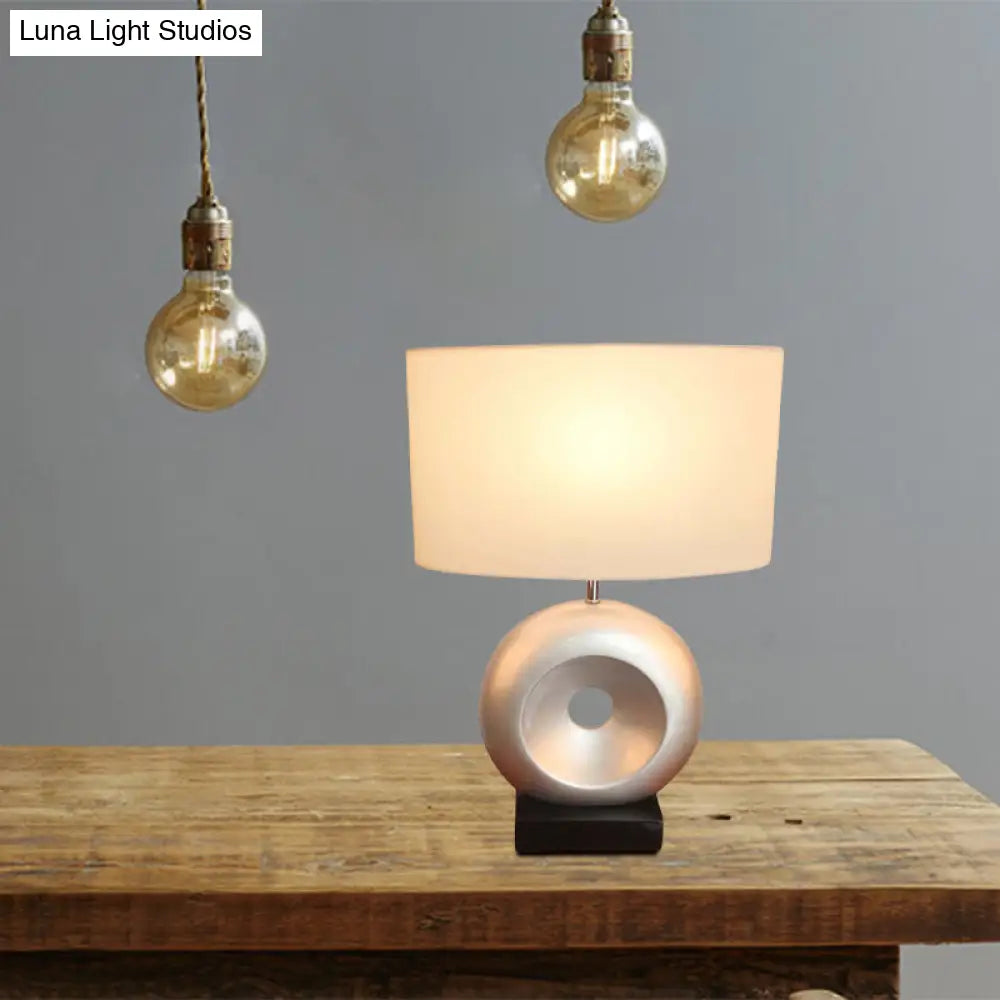 Transitional Resin Table Light with Silver/Black Finish, Rectangle/Drum Fabric Shade, and 1 Bulb