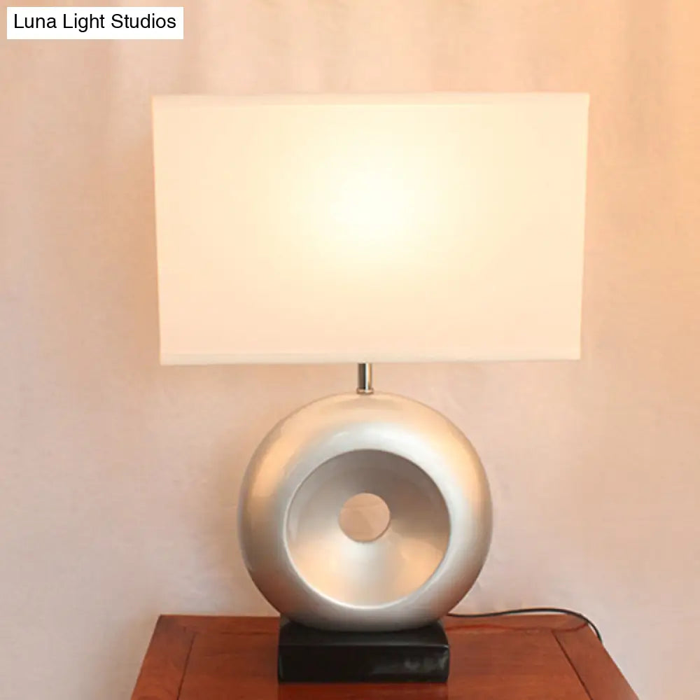 Transitional Resin Table Light with Silver/Black Finish, Rectangle/Drum Fabric Shade, and 1 Bulb