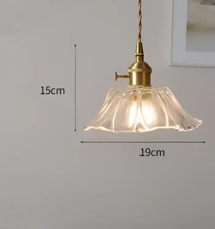 Vintage-style brass pendant light with clear fluted glass shade ideal for decorbites blue glass pendant lighting