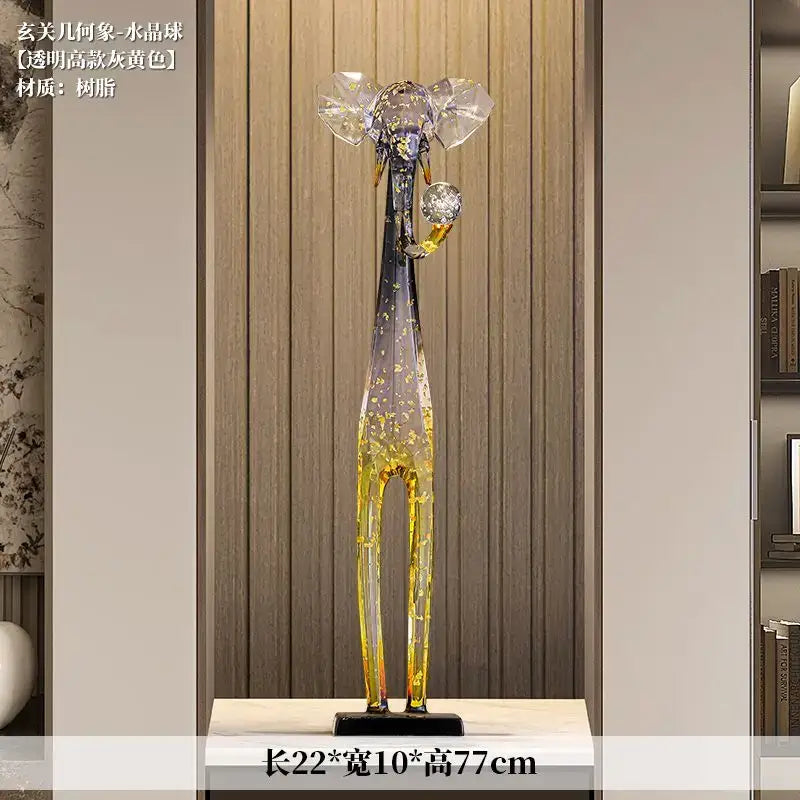 Translucent blue and yellow glass elephant floor decoration sculpture with golden speckles for living room decor