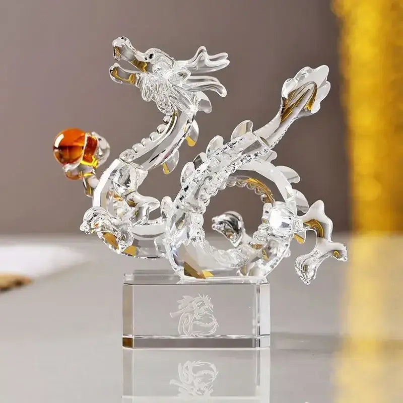 A translucent golden crystal dragon statue with amber orb and gold accents feng shui decorbites crystal dragon decor