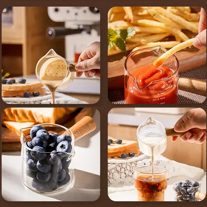 Transparent glass espresso measuring cup with wood handle designed for serving or pouring sauces and beverages