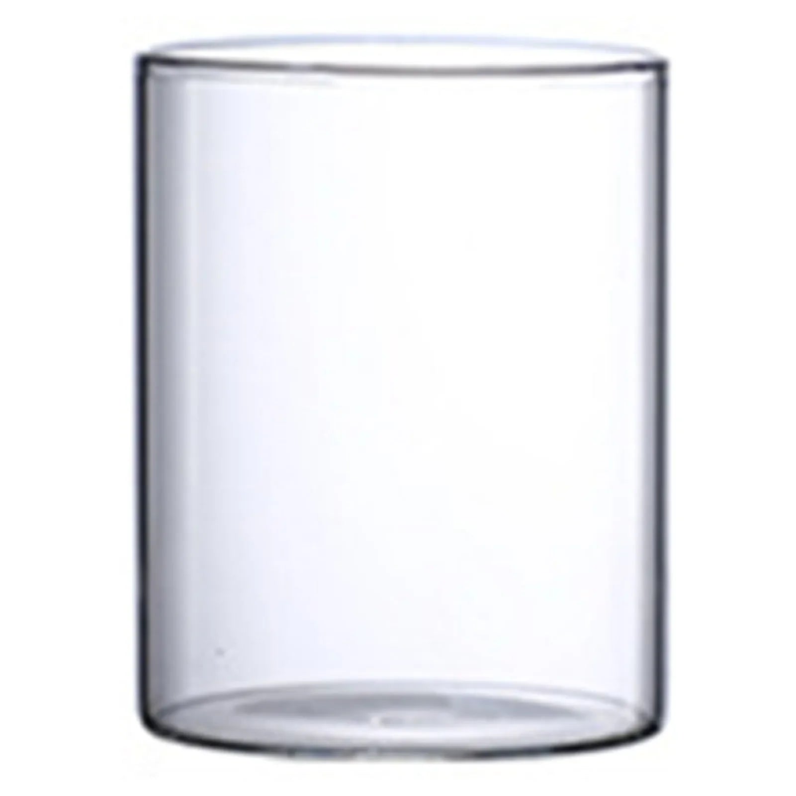 Clear cylindrical glass tumbler with smooth transparent walls and rounded rim for minimalist hydroponic vase use