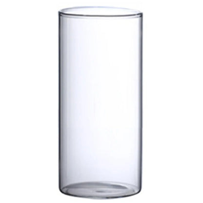 Clear cylindrical glass vase with smooth transparent walls and slightly rounded base for hydroponic and decorative use