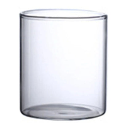 Clear transparent glass hydroponic vase with smooth cylindrical shape and rounded rim for wedding and living room decor