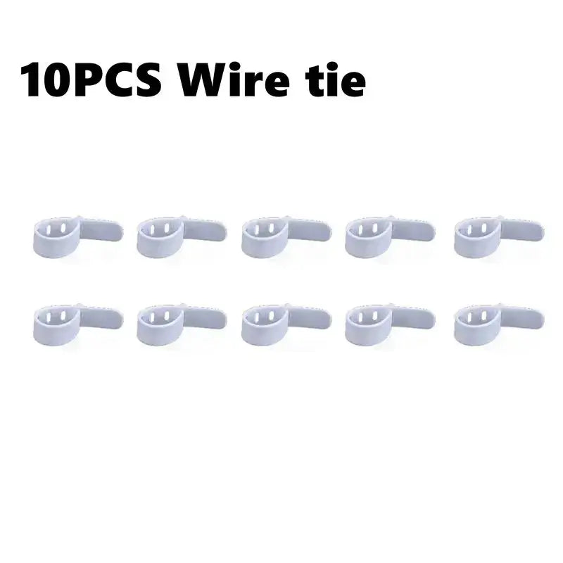 White plastic wire ties with looped ends and three holes for adjustable securing in decorbites cable storage box
