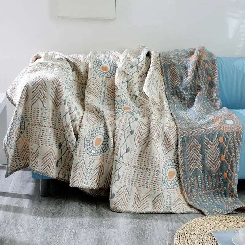 Tribal beige quilted sofa throw blanket with textured geometric pattern in cotton for living room use