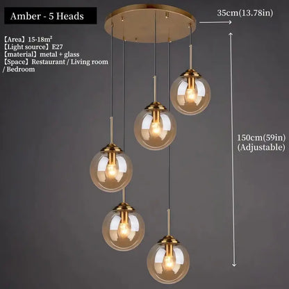 Trio multi tone glass pendant light with gold toned metal and smoked glass featuring five spherical bulbs in polished steel