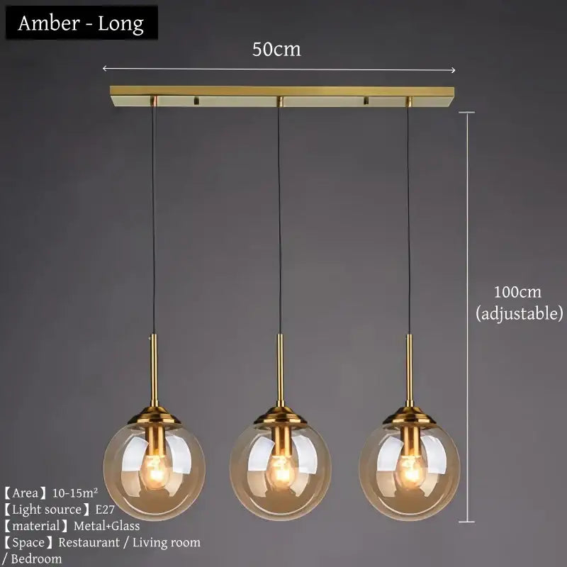 Amber-colored glass pendant light with brass accents and adjustable length in polished steel for dining room use