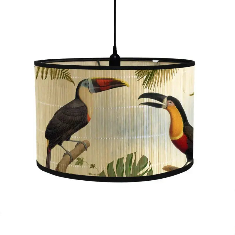 A beige fabric decorbites bamboo pendant light with tropical toucan illustrations for dining room decor
