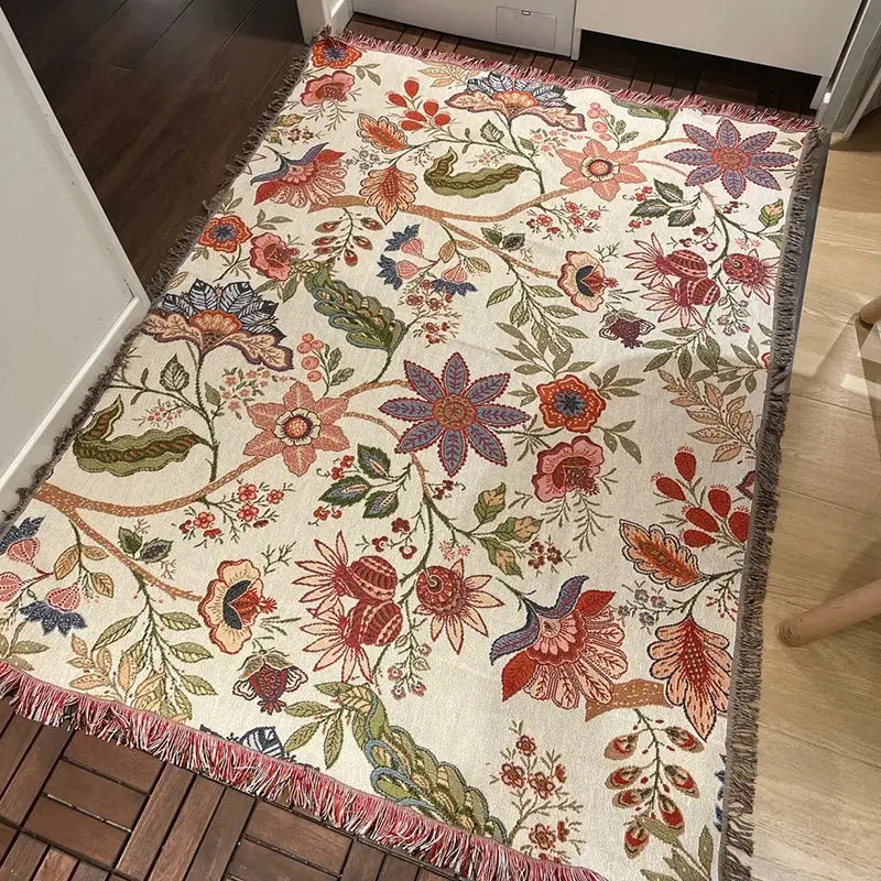 Cream-colored woven rug with vibrant red purple and green floral pattern for decorbites cozy knit throw blanket decor
