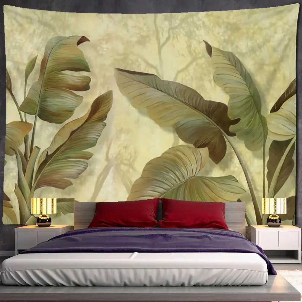 A large beige and green banana leaf tapestry wall hanging above a bed for tropical bedroom decor