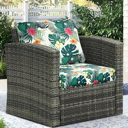 Dark gray wicker armchair with vibrant tropical floral cushions in brushed polyester microfiber for outdoor use