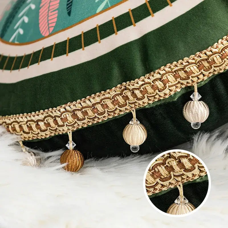Gold-toned braided trim with clear crystal bead tassels on tropical green decorbites ethnic print tassel cushion cover