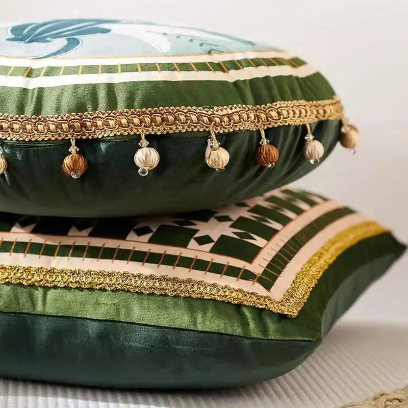 Emerald green satin cushion cover with gold braided trim and ethnic print tassel for decorbites living room decor