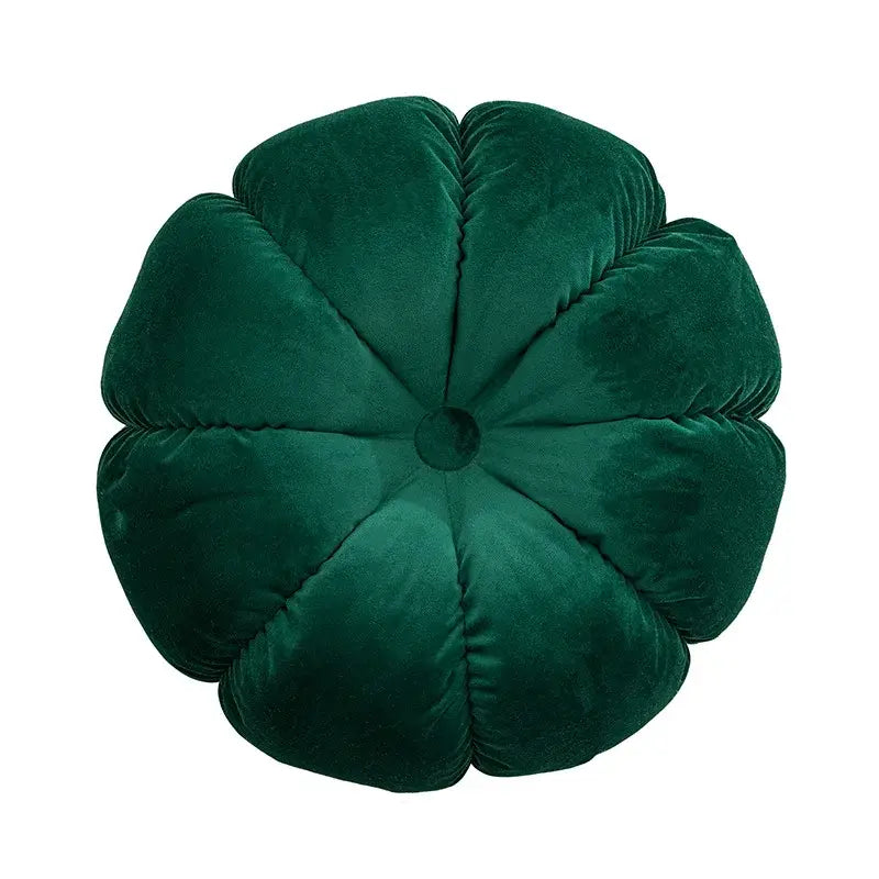 Deep emerald velvet flower-shaped cushion with quilted petals and button decorbites ethnic print tassel cushion cover