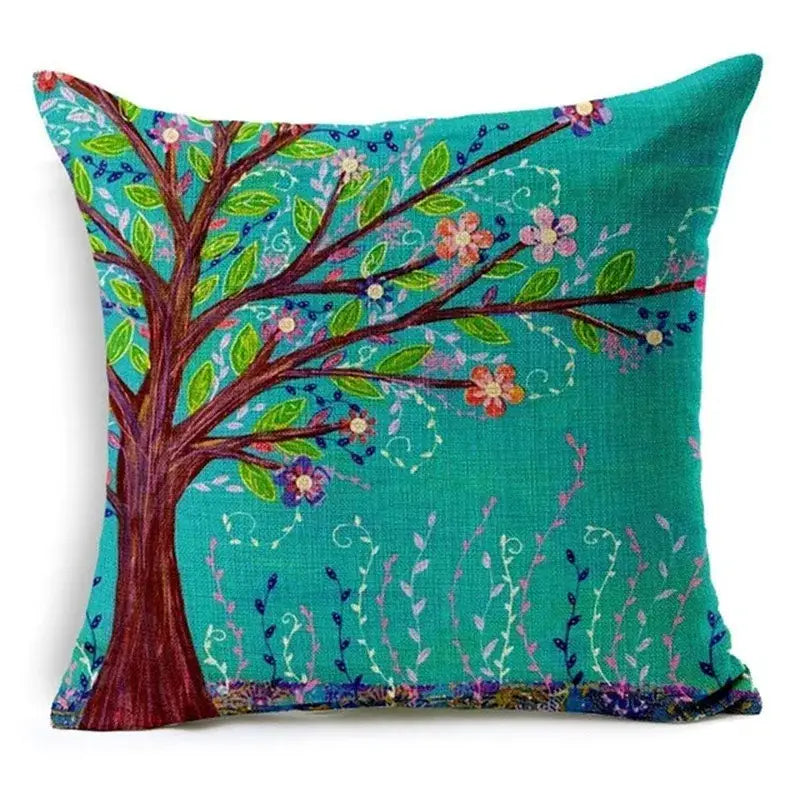 A square turquoise cushion cover with embroidered tree design featuring green leaves decorative home decor