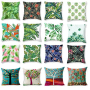 A collection of vibrant tropical green leaves decorative cushion covers with colorful flowers for home decor