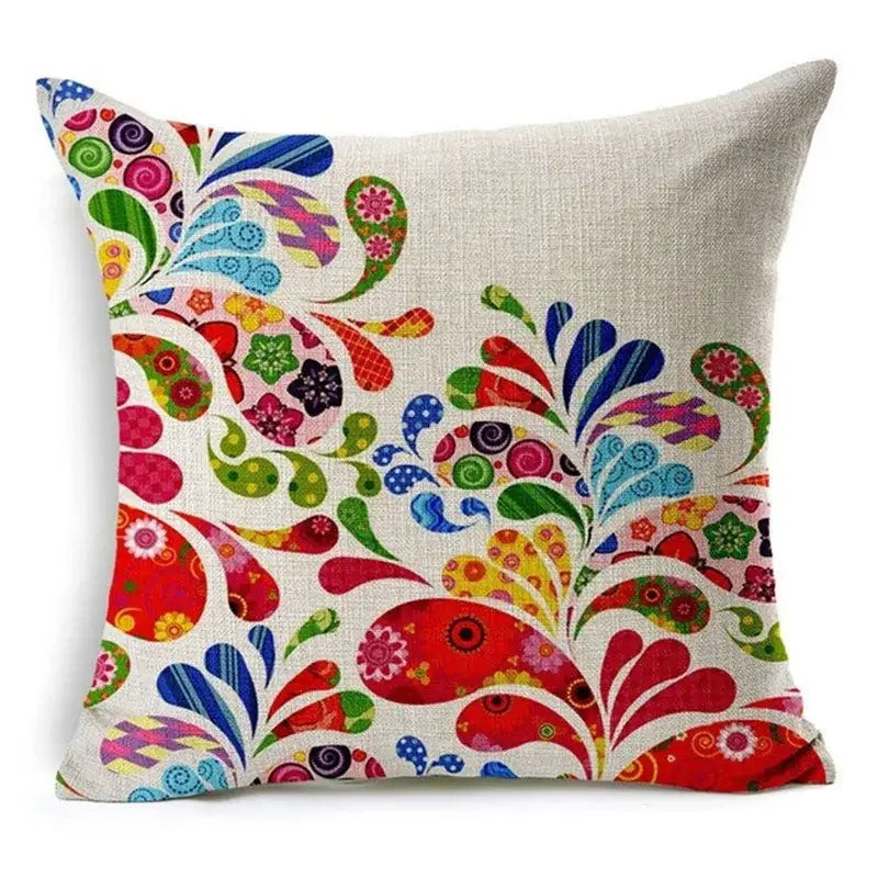 A vibrant square throw pillow with colorful paisley and floral pattern on beige linen fabric for green leaves decorative home decor