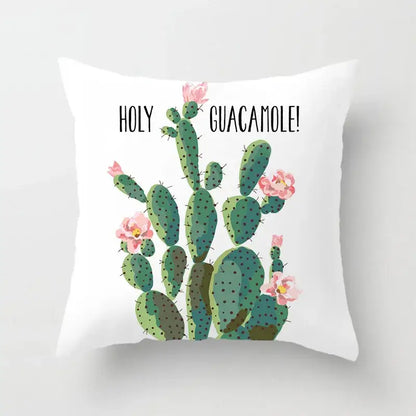 White throw pillow with green leaves decorative cactus illustration and holy guacamole text for home decor