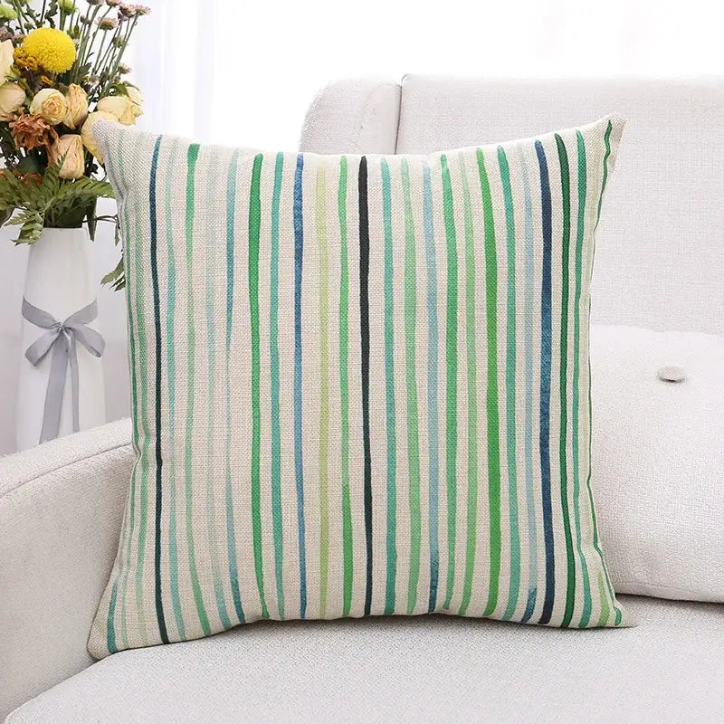 Square cushion cover with vertical green plant leaves stripes in green blue and black on beige linen for living room decorbites