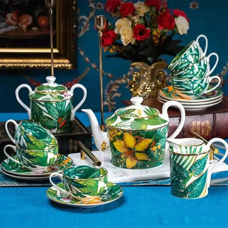 A vibrant green leaf collection porcelain tea set with yellow tropical leaf patterns and gold trim for dining experience