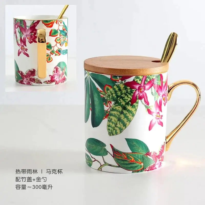 A white ceramic mug from the green leaf collection with pink orchids and gold accents for an elegant dining experience