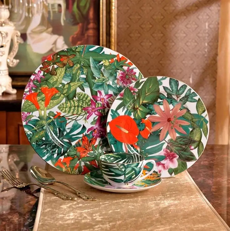 Vibrant tropical green leaf collection porcelain tea set with bold green orange and pink floral patterns on glossy white porcelain
