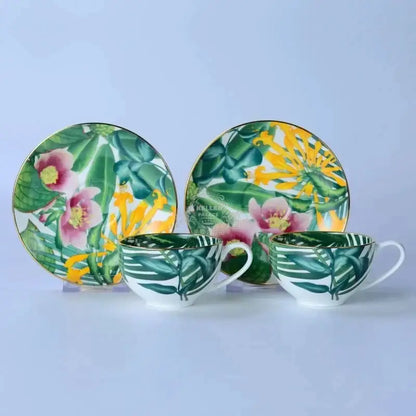 Tropical green leaf collection porcelain tea set with floral patterned cups and gold rims for dining room use