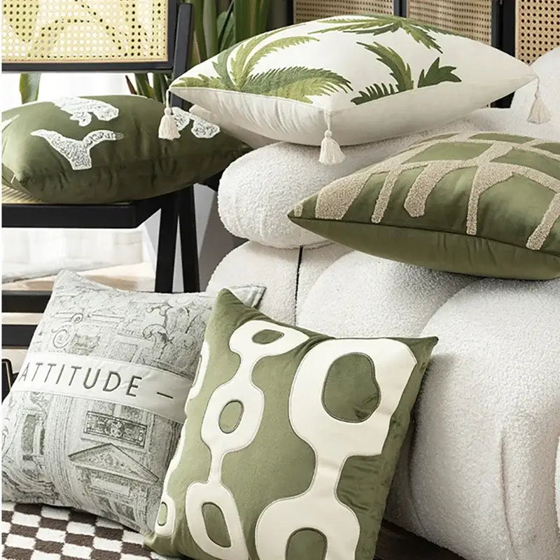 Tropical olive and cream embroidered patchwork cushion cover with geometric pattern and tassels for living room use