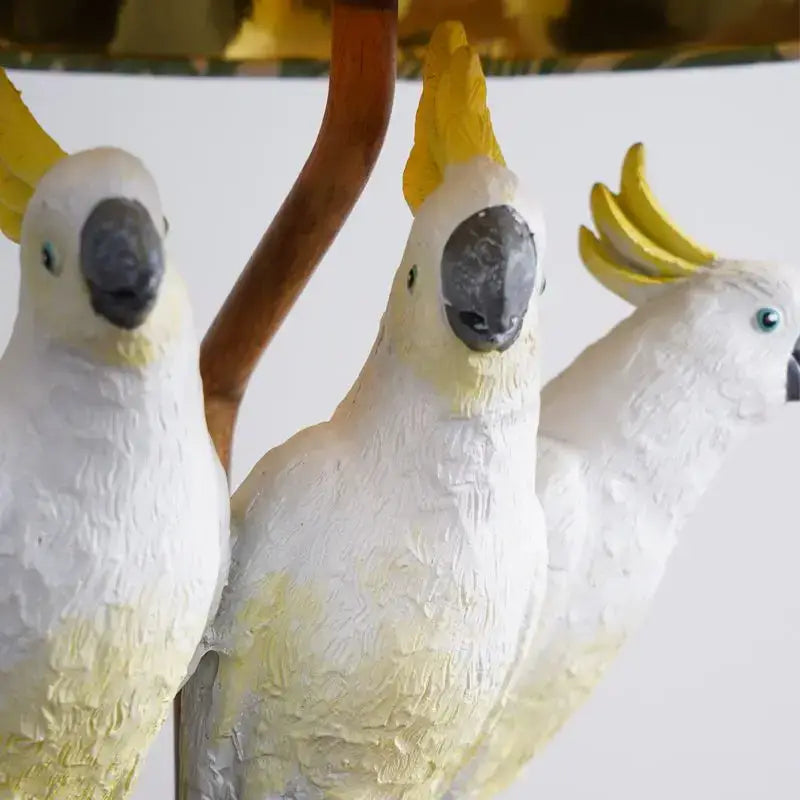 Tropical parrot desk lamp featuring white and yellow cockatoo figurines with textured feathers for children room decorbites cartoon parrot