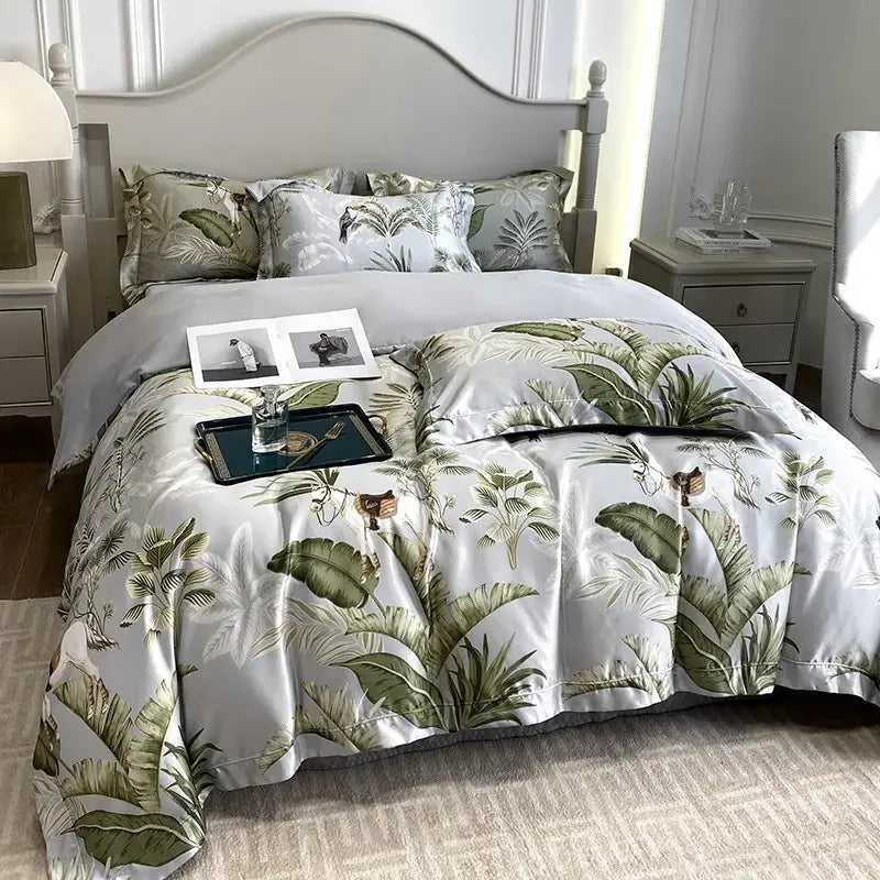 White satin duvet cover with lush green tropical leaf pattern in decorbites ice silk plant bedding set for bedroom comfort