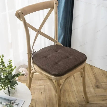 Brown tufted textured chair cushion designed for wooden cross-back decorbites dining chair for dining room use