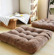 Brown velvet corduroy floor seat cushion with tufted square design by decorbites for living room decor