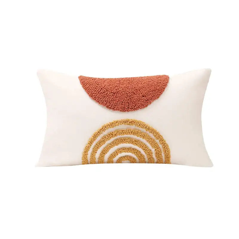Cream-colored rectangular cushion cover with burnt orange and yellow decorbites gematric tufted design for living room decor