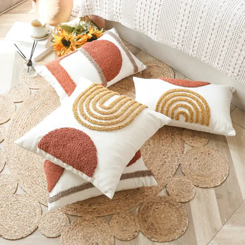White throw pillows with textured burnt orange and mustard yellow geometric embroidery cushion cover decorbites gematric tufted