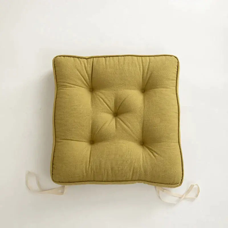 Mustard-yellow tufted decorbites button cushion with textured fabric and ties for living room furniture decor
