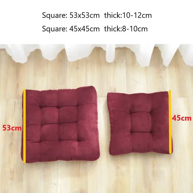 Two plush burgundy tufted seat cushions with yellow trim made of corduroy for decorbites corduroy floor seat use