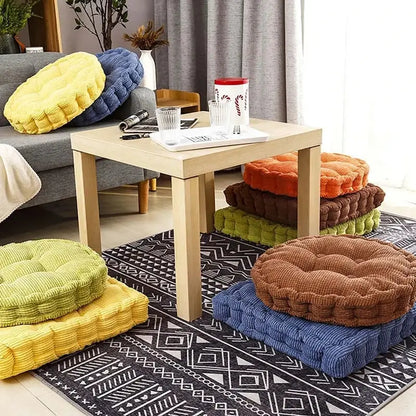 Stacked decorbites corduroy tufted floor seat cushions in vibrant yellow blue orange brown and green for living room decor