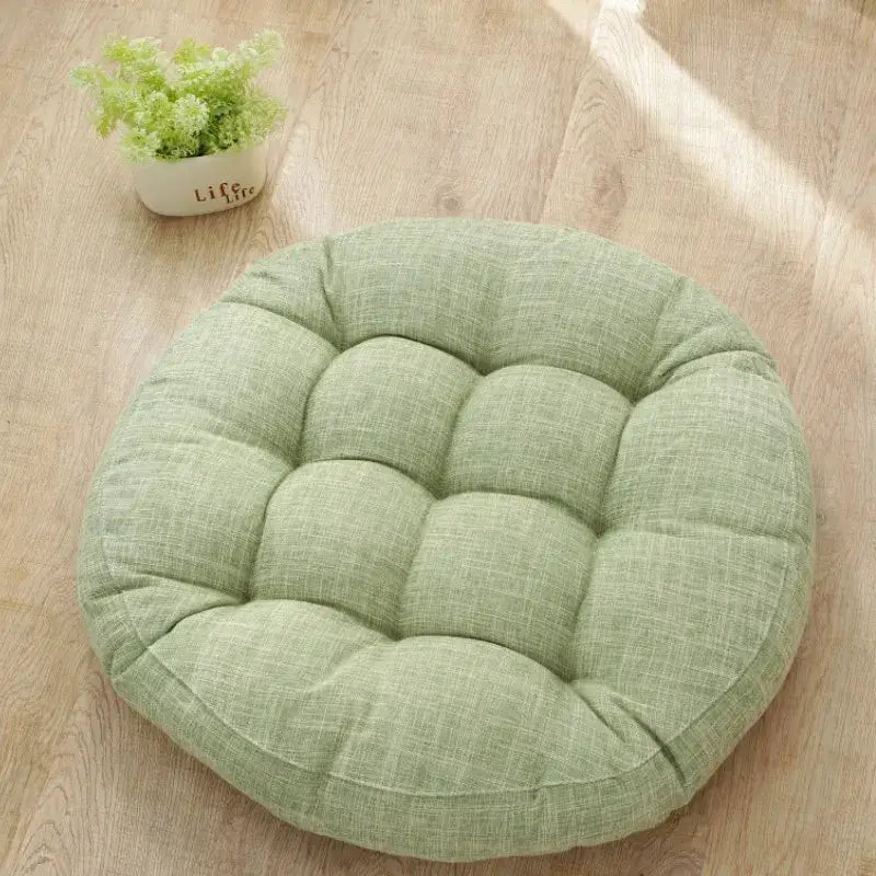 Light green tufted textured fabric kids round floor cushion from decorbites for bedroom seating and decor