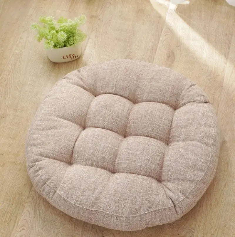 Beige tufted kids round floor cushion with textured linen fabric for bedroom seating decorbites kids round use